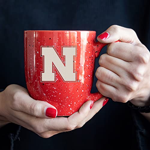 Image of Rico Industries NCAA Nebraska Cornhuskers Red Personalized 16 oz Team Color Laser Engraved Speckled Ceramic Coffee Mug