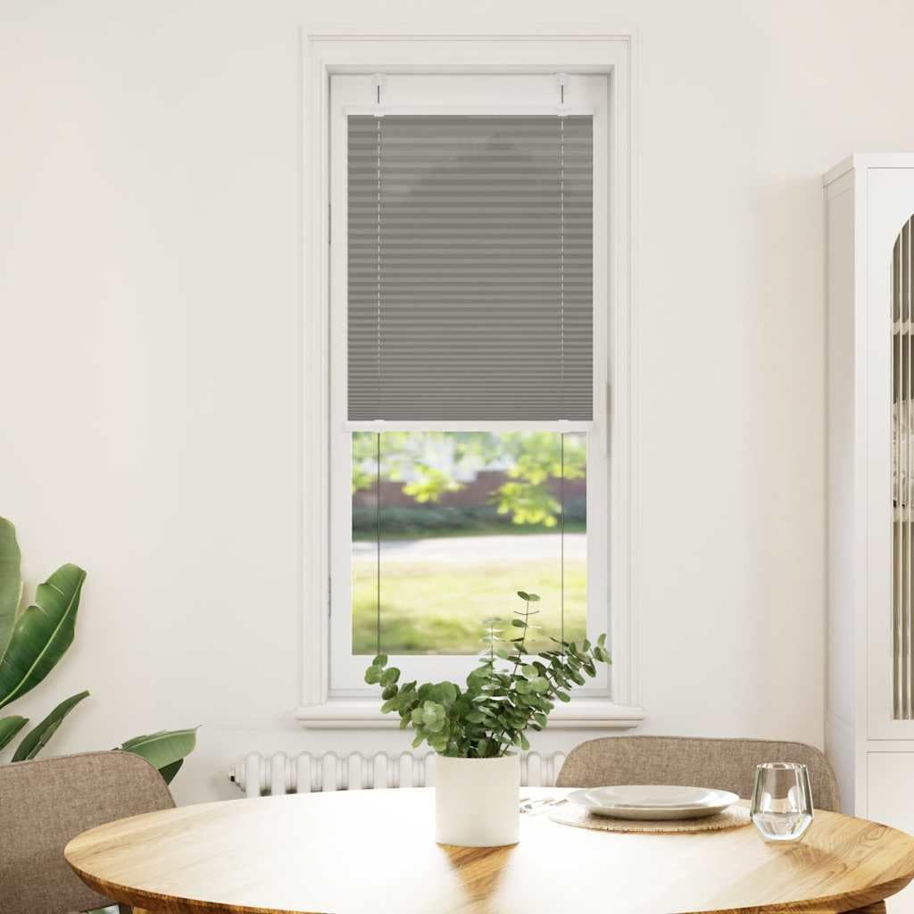 Store plissé anthracite pour salon et bureau : créez une ambiance cosy