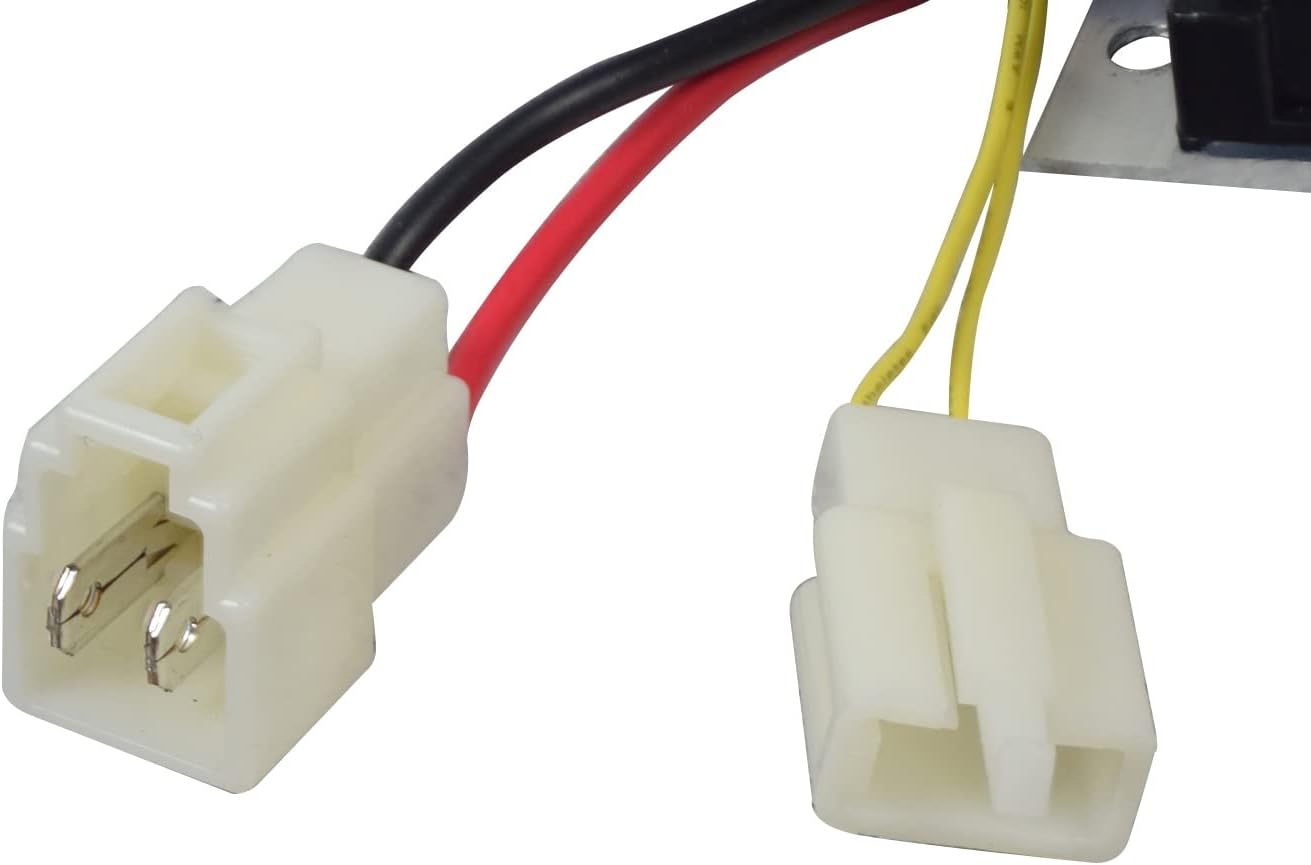 Close-up of two white electrical connectors with red and black wires