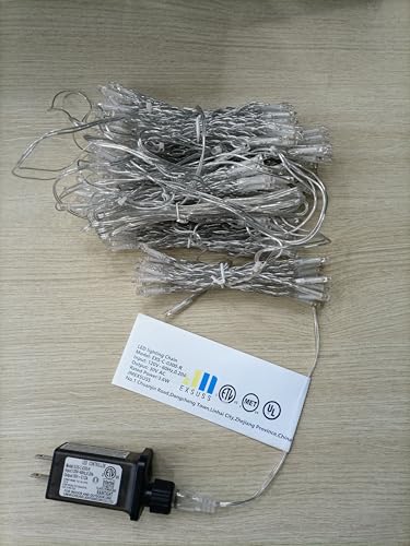 Image of JMEXSUSS 300 LEDs Christmas Curtain Lights Plug in, 9.8x9.8ft, Multicolor