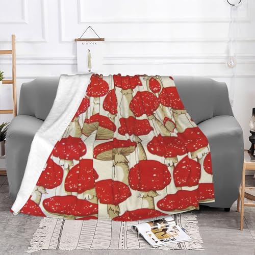Plaid champignon rouge et blanc pour soirées cocooning sur le sofa