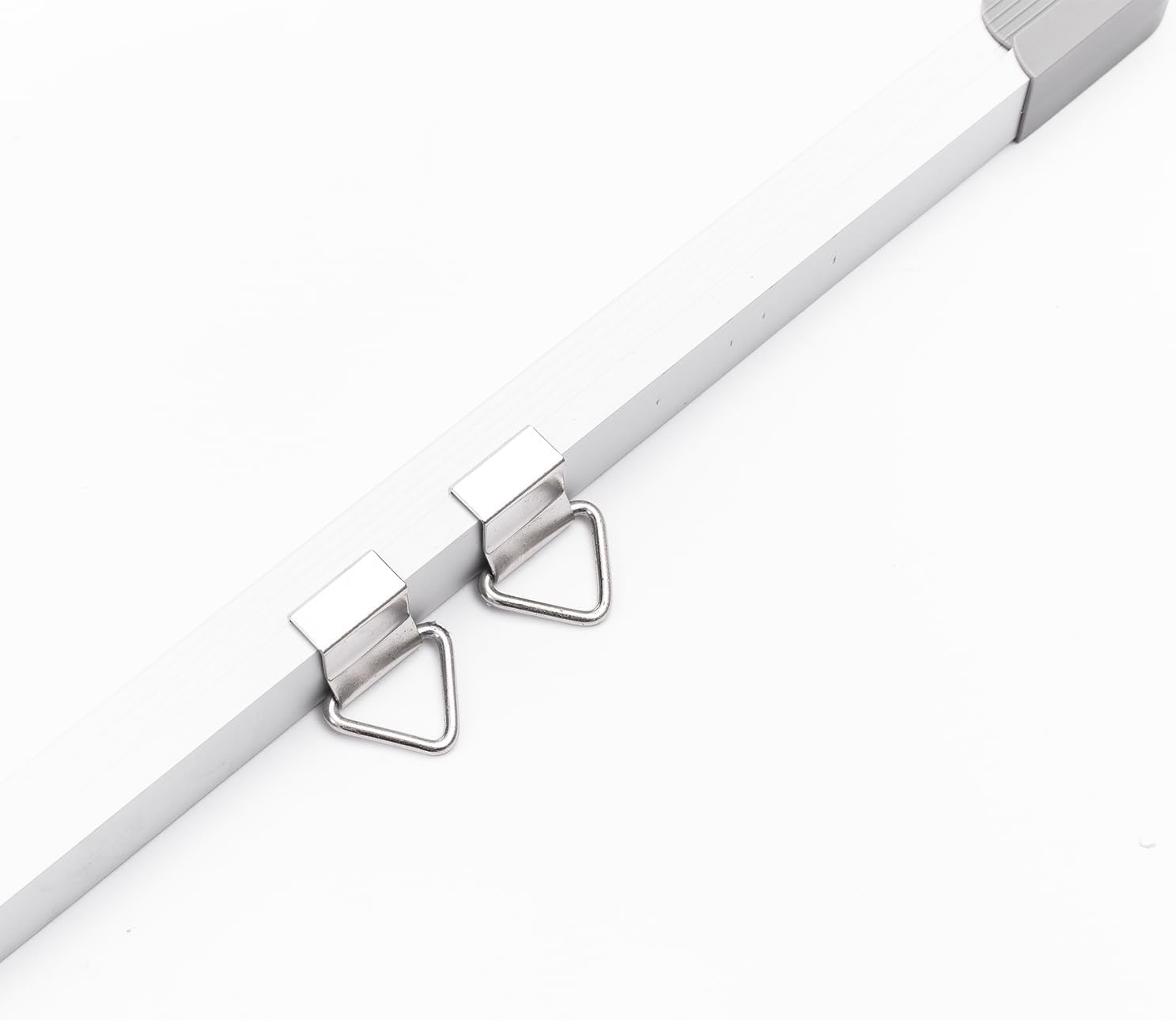 Close-up of mounting hangers on the whiteboard frame
