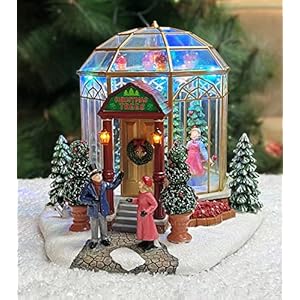 Moments In Time Christmas Village Building, Christmas Tree Shop with LED Lights and Christmas Music – Battery Operated…