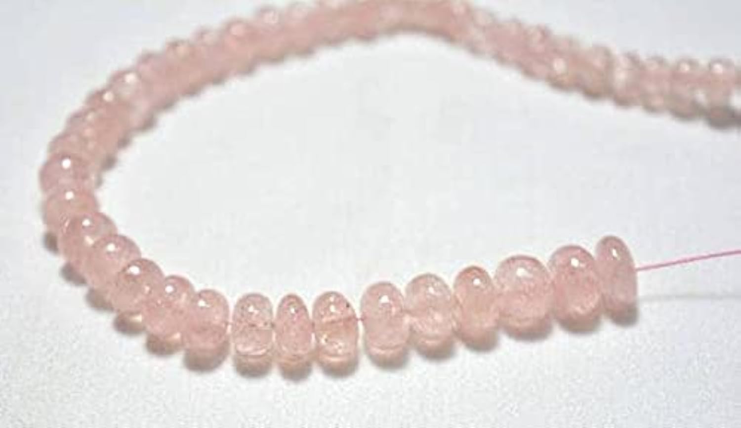 Morganite perles rondelles lisses pour éviter les irrégularités de vos bijoux