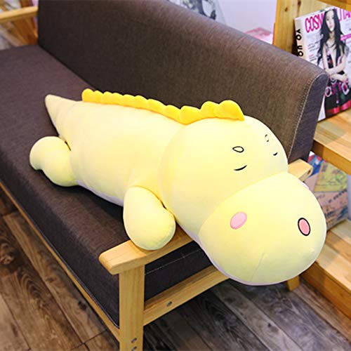 Jouet en peluche dinosaure câlin pour apporter tendresse et réconfort au lit