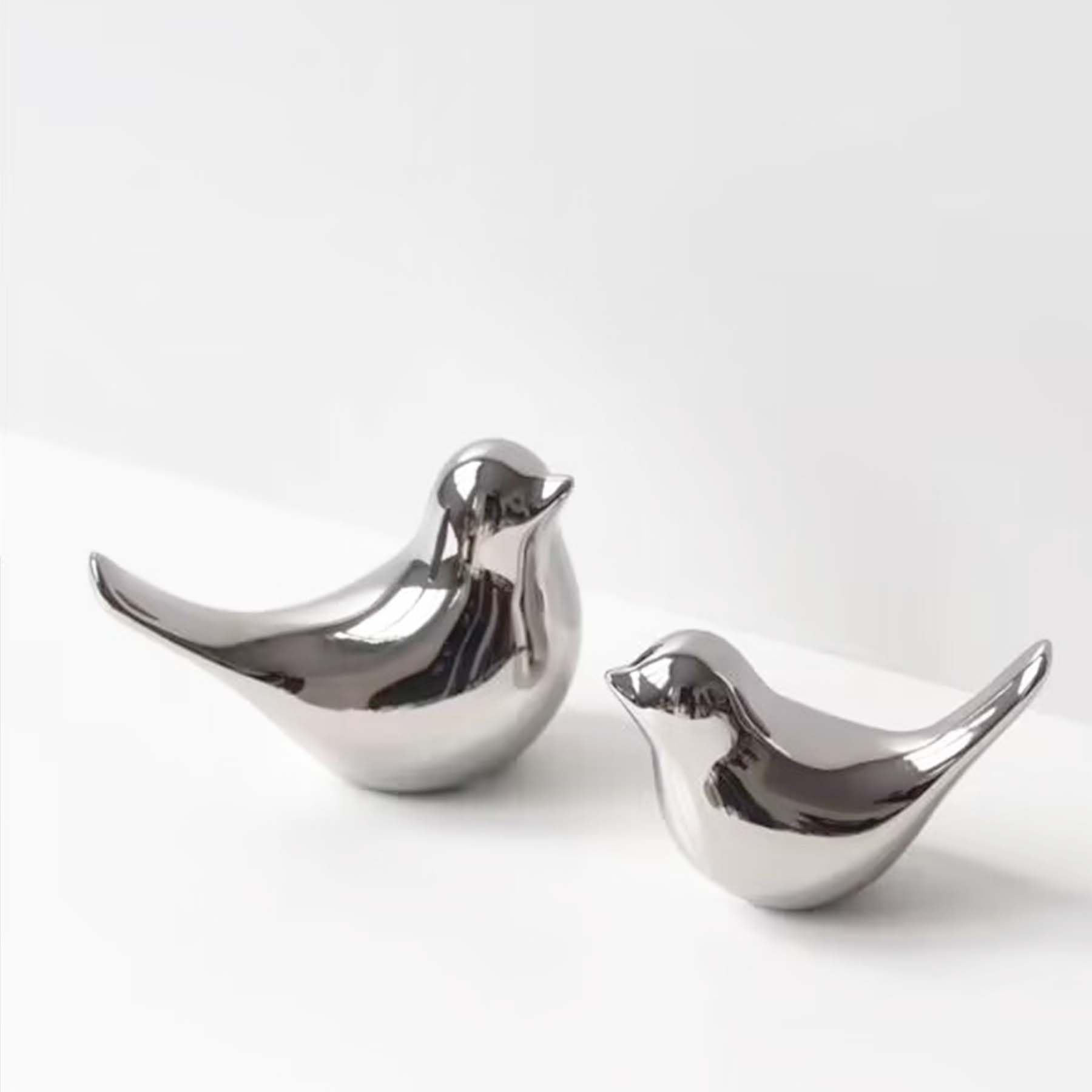 Tibeoyad 2 piezas de pequeñas estatuas de pájaros, pájaro de cerámica, esculturas modernas de aves de animales para paisaje, jardín, hogar, oficina, escritorio, decoración (plata)
