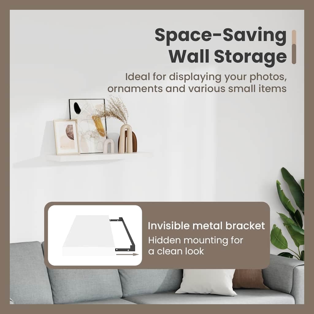 A white floating shelf being slid onto a black metal mounting bracket, showing the invisible mounting mechanism.