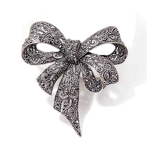 Grande broche nœud papillon noir à strass pour illuminer un look de soirée ou un manteau hiver