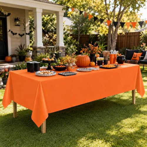 Image of WNINK 2 Pack Orange Plastic Tablecloths, 54 x 108 Inch Disposable Covers | Ideal for Halloween, Thanksgiving, Birthdays and Fall Parties, Helping Protect Tabletops from Spills and Simplify Cleanup