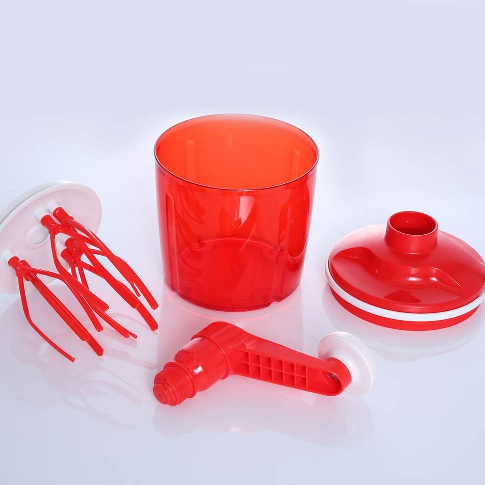 All components of the Tupperware Speedy Chef disassembled: the transparent red container, the red lid with white ring, the red whisk attachment, and the red crank handle.