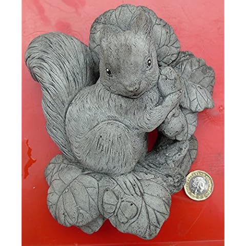 Wall Plaque of a Squirrel. Stone concrete Garden Ornament. Hand Mixed, Cast, Coloured and Finished by Bekki. 14 x 6 x 15 cms, 822 grams Cover
