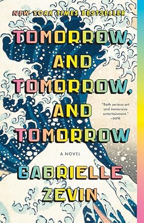 Tomorrow, and Tomorrow, and Tomorrow by Gabrielle Zevin, an adventure fiction book cover depicting an illustrated blue and white wave. The title and author name are overlaid on the illustration in gradient rainbow letters.