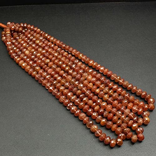 Perles en quartz rutilé rouge facettées, l'éclat d'une gemme rare