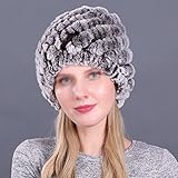 Aus weichem Kaninchenfell gefertigt, passt es sich der Haut an und hält sie warm und weich.Hat eine erstaunlich seidige Glätte.
