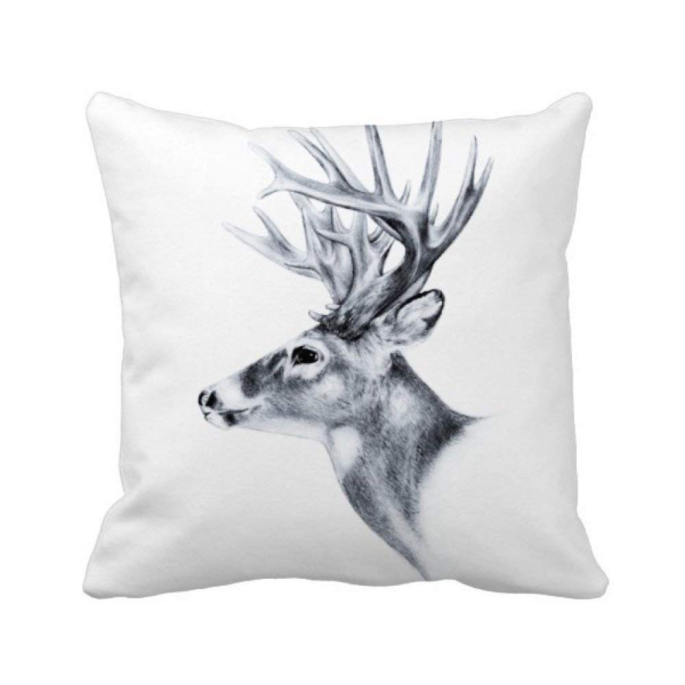 Housse de coussin cerf noir et blanc pour masquer un vieux fauteuil usé avec élégance