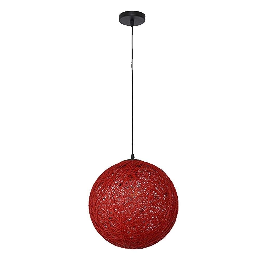 Lustre boule en rotin de 25 cm créant une ambiance pastorale dans votre salon