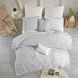 La parure de lit Urban Habitat Brooklyn en coton jacquard apporte une touche douce et charmante à votre chambre