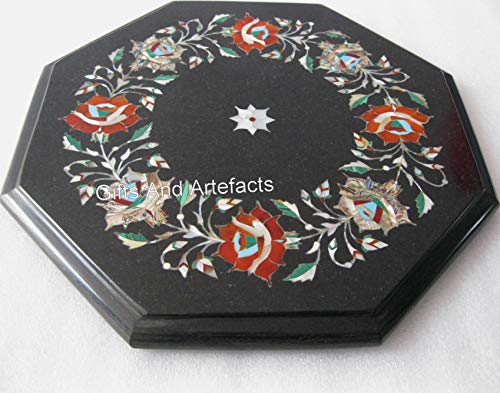 Table basse en marbre noir compacte pour optimiser les petits salons