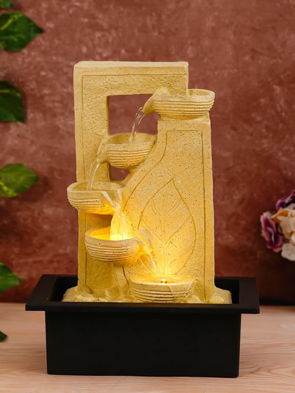 Image of Polyresin Table Top Stylish Leaf Print 4 Diya Steps Indoor Water Fountain for Home Decor with LED Light & Speed Controller Pump (Size: 40 x 29.5 x 22CM | Colour: Cream | Weight: 2250 gram)