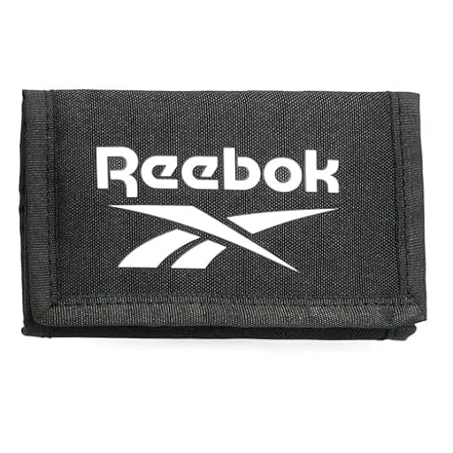 Reebok Ashland Cartera con Monedero Negro 13x8x2,5 cms Poliéster by Joumma Bags | Ya disponible en tu tienda friki favorita! En mundofriki.es! Reebok Ashland Cartera con Monedero Negro 13x8x2,5 cms Poliéster by Joumma Bags | Ya disponible en tu tienda friki favorita! En mundofriki.es!