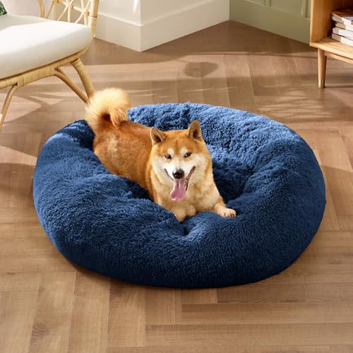 Image of Bedsure Calming Dog Bed for Medium Dogs - Donut Washable Medium Pet Bed, 30 inches Anti-Slip Round Fluffy Plush Faux Fur Cat Bed, Fits up to 45 lbs Pets, Navy