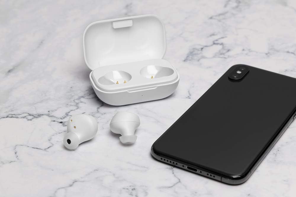 STREETZ TWS-111 earbuds and charging case next to a smartphone, illustrating Bluetooth pairing.