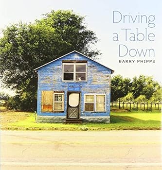 Paperback Driving a Table Down Book