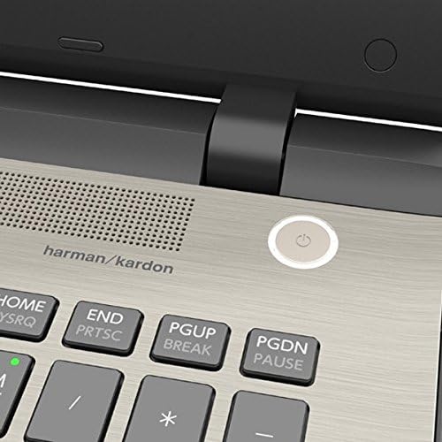 Close-up of Toshiba Satellite S55 power button and speaker grille