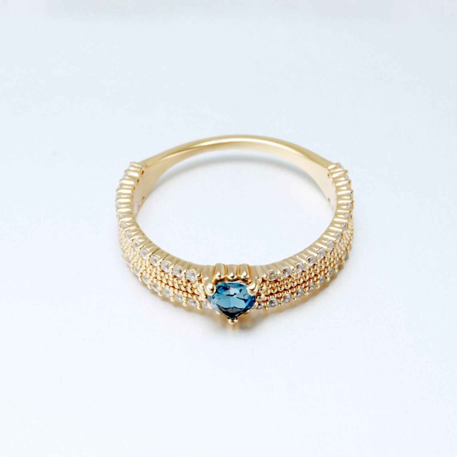 Anelli nuziali in oro 375/585/750 con cuore e topazio blu