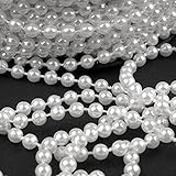 Material: Nylonfaden, Plastikperlen, Stoffrosen, Plastikdeko