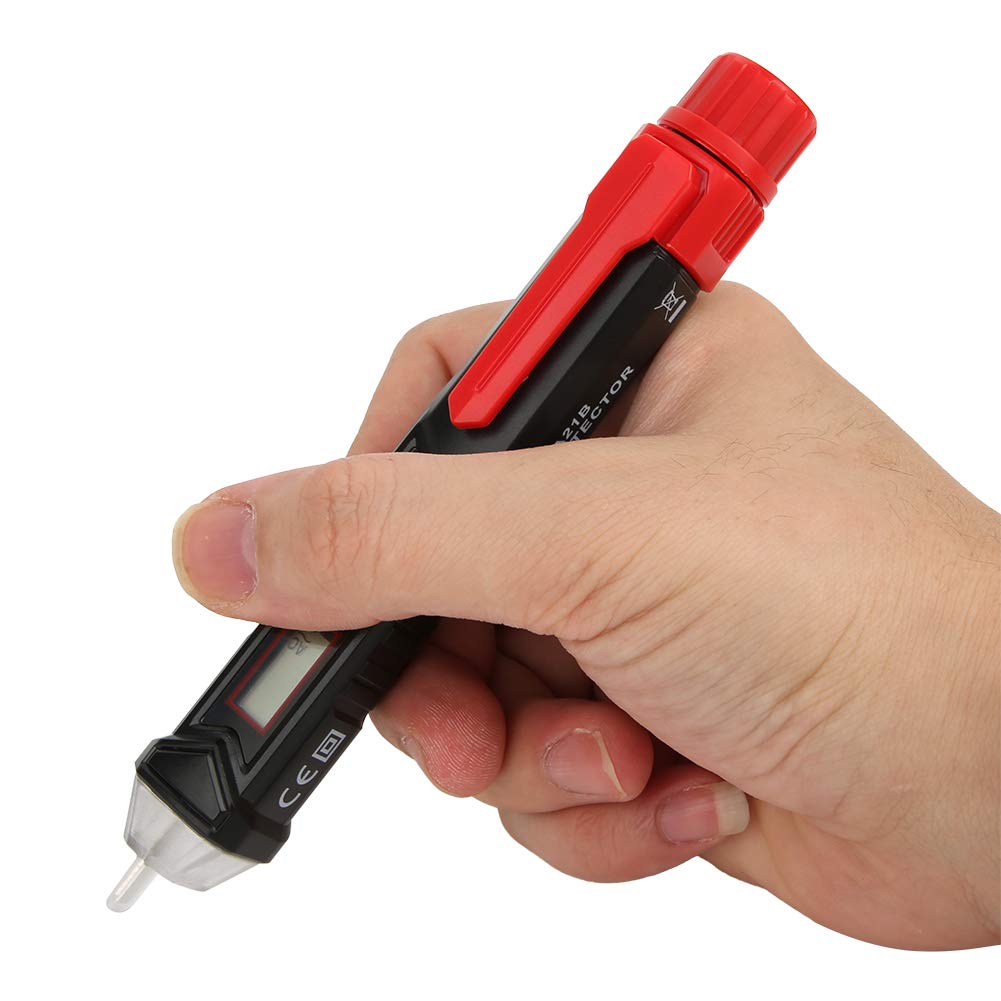 Hand holding SASKATE TA11B Voltage Tester during use
