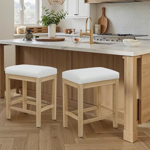 Image of RNKSFX Counter Height White Bar Stools Set of 2 for Kitchen Counter Farmhouse Modern Barstools with Faux Leather Upholstered Backless Seat and Solid Wood Legs 24 inch Bar Chairs, White + Wood Color