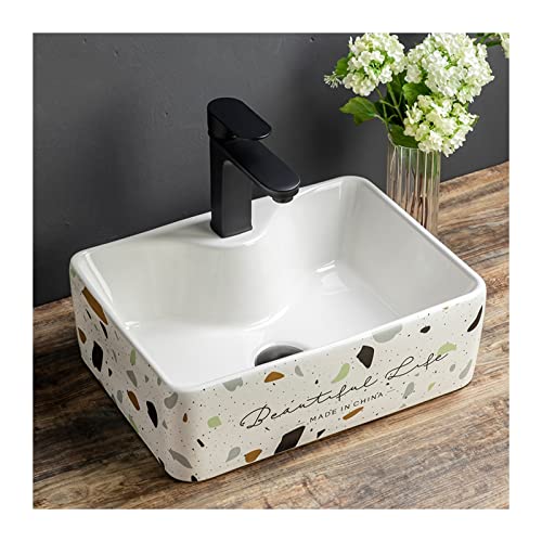 Lavabo rectangular de terrazo moderno con grifo negro para optimizar baños pequeños 2