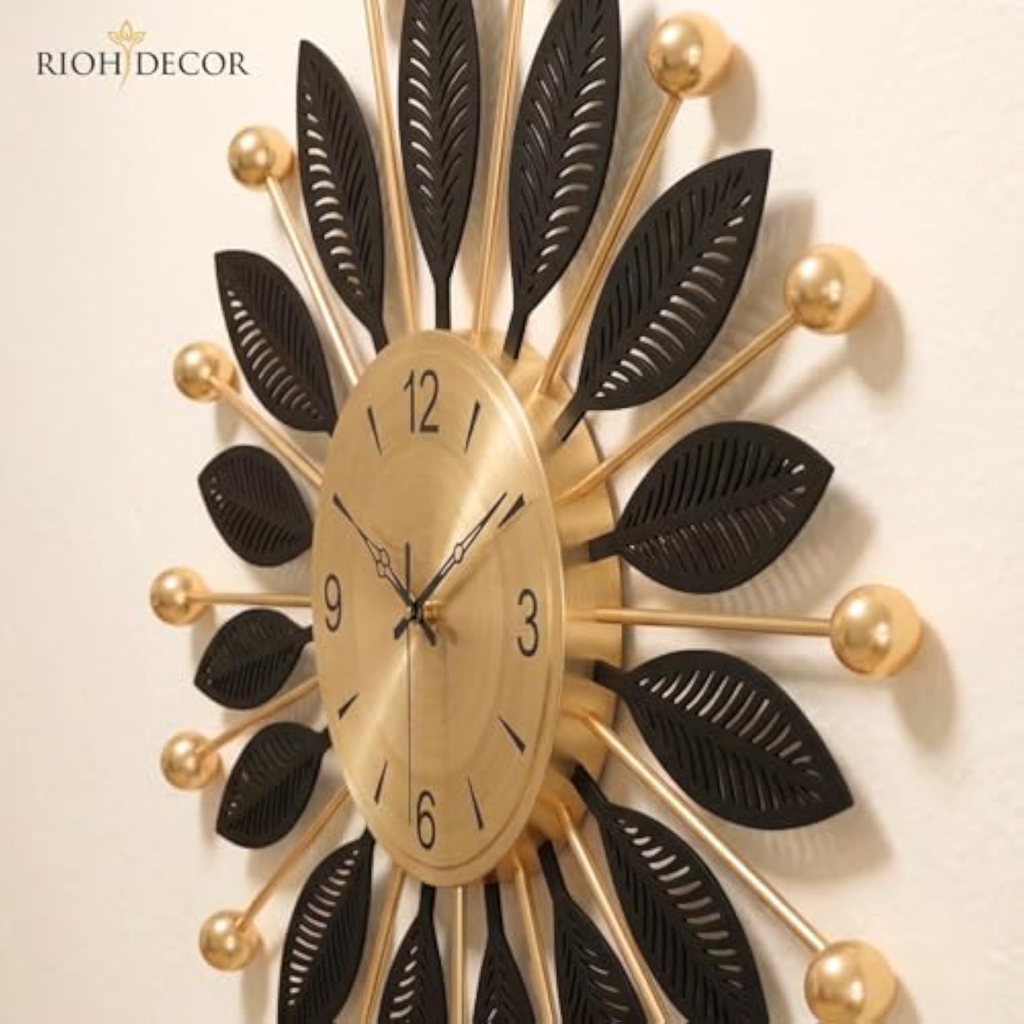 Luxury Metal Wall Clock with Black Leaf Design