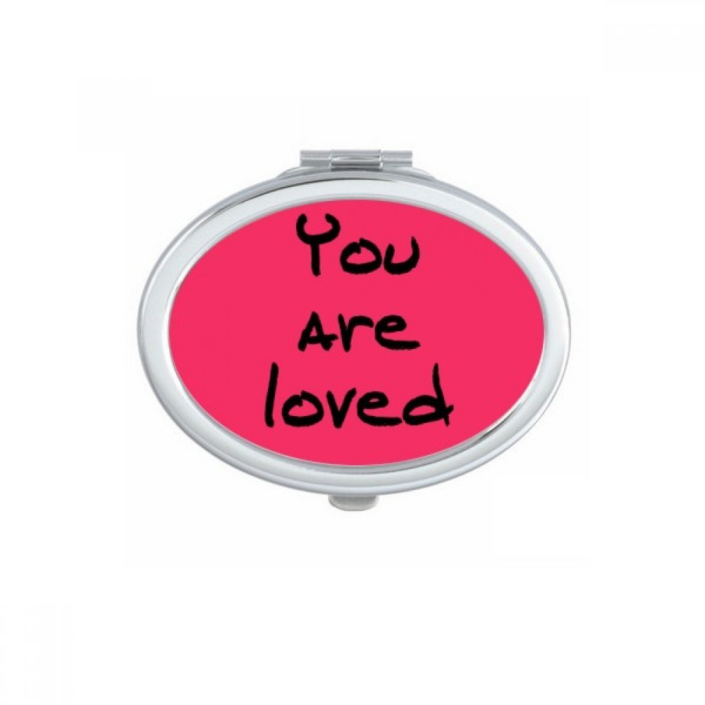 Miroir de poche ovale avec citation inspirante pour retouches maquillage quotidiennes