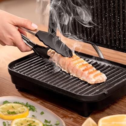 Cecotec Elektrischer Grill Rock'Ngrill 1300 Wood B. Leistung von 1300W, schwarzes Design, Rockstone-Beschichtung, rutschfeste Basis, schwebende Platte, Leuchtanzeige, Holzgriff, Vielseitigkeit. – Bild 7