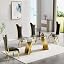 Gold Table and 4 Black Chairs
