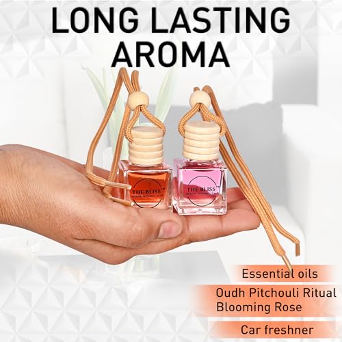 Image of The Bliss Car Perfume, Air Freshener with Essential Oils Long lasting Fragrance in Glass bottle with Wooden Diffuser Lid (Pack of 2, Oudh Patchouli Ritual & Blooming Rose,10 ml*2)