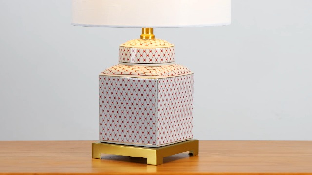 Image of JONATHAN Y Cleo 21.5 inch Red & White Ceramic Table Lamp with Brass Base