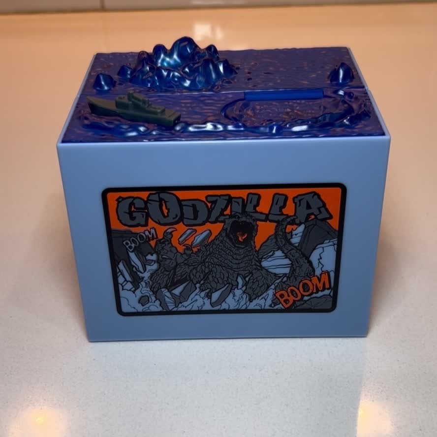 Watch Godzilla steals your coins with this piggy bank! on Amazon Live