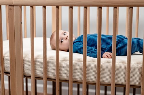 Image of Naturepedic Oval Baby Crib Mattress - Lightweight Infant & Toddler Mattress - Waterproof Bed Mattress for Crib - Non-Toxic Mattress for Baby Bed V3 (27.5 inch x 53.7 inch x 3 inch)