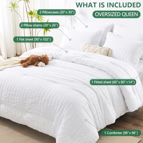 Image of HIMEET Oversized Queen Comforter Set - 7 Pieces Seersucker Bed in a Bag, Boho Bedding Sets for Bedroom Decor, All Season Home Essential Bed Set with Comforter, Sheets, Pillowcases & Shams, White