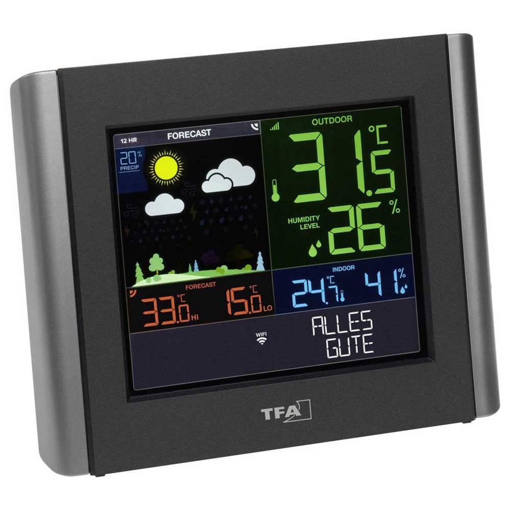 Close-up of the TFA Dostmann VIEW METEO Weather Station display showing current outdoor and indoor temperature and humidity, along with a weather forecast icon.