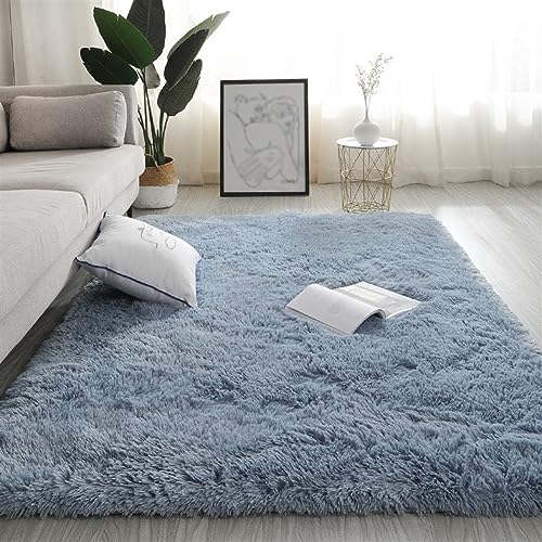 Tapis pelucheux à poils longs bleu d'une douceur premium pour grand salon