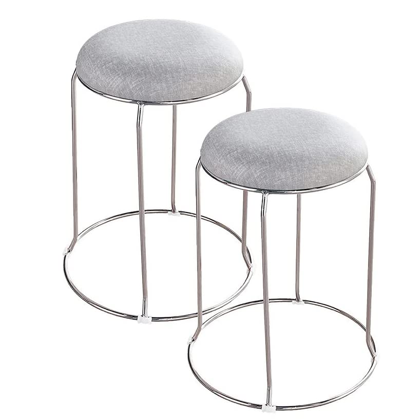 Tabourets empilables ronds en métal et tissu pour le salon