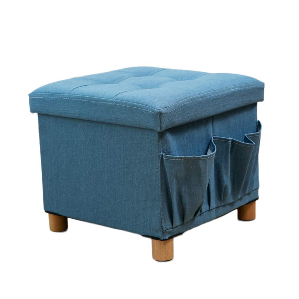 Pouf de rangement coffre bleu dans un salon chaleureux