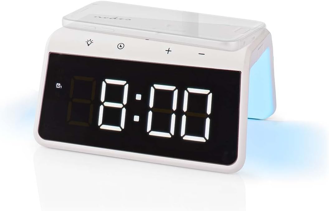 De sus în jos view of the Nedis Alarm Clock with a smartphone placed on its top surface, indicating wireless charging in progress.
