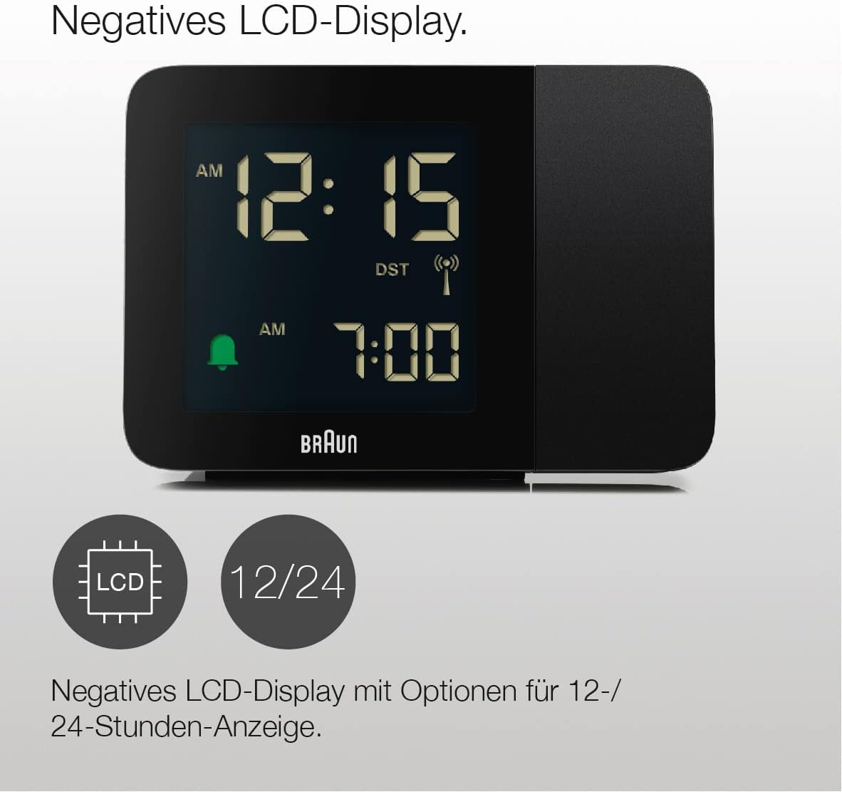 Close-up of the Braun alarm clock's negative LCD display showing time 12:15 AM and alarm 7:00 AM.