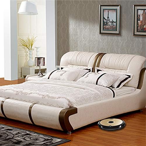 Robot vacuum cleaning under a bed in a bedroom setting