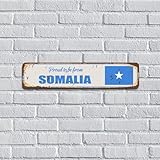 Letrero de metal con texto en inglés 'Proud to Be from Somalia' Gifts Posters Flag Travel Trip Globe' Party Rustic Metal Plate for Room Cabin Fence Wall Decorations 4x18 Inch